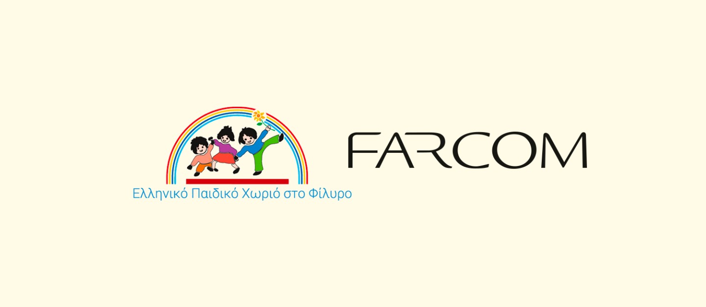 Farcom standing by the children of the GREEK CHILDREN’S VILLAGE at Filiro